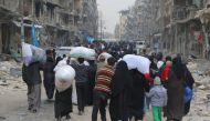 Syrians living in Aleppo flee the city due to ongoing regime forces attacks and move to opposition controlled areas on December 1, 2016. ( Ibrahim Ebu Leys - Anadolu Agency )