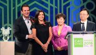 (L-R) Brazilian Eduardo Paes, French Anne Hidalgo Mayor of Paris, Stella Li Senior Vice President of BYD Company and Wang Chuan-Fu Chairman and President-CEO of BYD pose during the Ceremony Awards of 