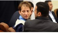 A picture made available on March 6, 2016 shows Iran's billionaire tycoon Babak Zanjani (C) in a court, in Tehran © Meghdad Madadi / AFP.