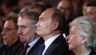 Russian President Vladimir Putin (2ndR) attends a show during the opening ceremony of the 5th edition of the Saint Petersburg International Cultural Forum, at the Mariinsky Theatre in Saint Petersburg on December 2, 2016. / AFP / SPUTNIK / Mikhail KLIMENT