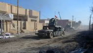 Military vehicles of Iraqi security forces are seen during a battle with Islamic State militants in Mosul, Iraq, December 4, 2016. REUTERS/Stringer
