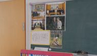 Pictures of the Japanese imperial family are displayed on a blackboard in a classroom at Tsukamoto kindergarten in Osaka, Japan, November 30, 2016. Picture taken on November 30, 2016. REUTERS/Ha Kwiyeon