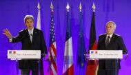 US Secretary of State John Kerry (L) and France's Foreign Minister Jean Marc Ayrault (R) give a press conference after a meeting in Paris on December 10, 2016. Kerry and leading diplomats are trying to find solutions for Syria's desperate opposition, as S