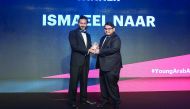 Ismaeel Naar receiving the award for 'Outstanding Young Arab Journalist' of the year in Dubai.