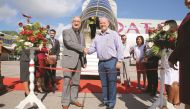 Qatar Airways Chief Commercial Officer, Dr Hugh Dunleavy (left), is welcomed by Seychelles Minister of Tourism, Civil Aviation, Ports and Marine, Alain St Ange, after the touchdown of the airline's inaugural flight to the Seychelles.