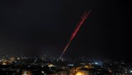 Govermental Syrian forces fire into sky as celebrating their victory against rebels in eastern Aleppo, Syria December 12,2016. REUTERS/ Omar Sanadiki 
