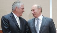 (FILES) This file photo taken on August 30, 2011 shows Russia's Prime Minister Vladimir Putin (L) speaking with ExxonMobil President and Chief Executive Officer Rex Tillerson during the signing of a Rosneft-ExxonMobil strategic partnership agreement in So