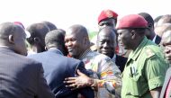 FILE PHOTO: South Sudanese rebel leader Riek Machar, who fled to Democratic Republic of Congo in August after fierce fighting, is being held in South Africa to stop him stirring up trouble, diplomatic and political sources said on Tuesday.