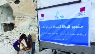 An RAF volunteer distributing aid in Aleppo.