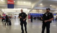 Atlanta police officers patrol at the check-in area as they carry sub-machine guns at Hartsfield-Jackson International Airport in Atlanta, Georgia, November 17, 2015 (REUTERS / Tami Chappell) 