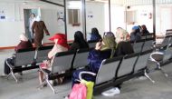 Syrian women sit in the waiting area to see a female doctor at a maternity clinic run by United Nations Population Fund inside Jordan's Al Zaatari refugee camp, which houses nearly 80,000 Syrian refugees, in Mafraq, Jordan November 22, 2016. Lin Taylor/Th