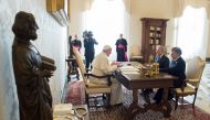 Pope Francis (L) meets Colombia's President Juan Manuel Santos (R) and former president Alvaro Uribe (C) at the Vatican December 16, 2016. Osservatore Romano/Handout via REUTERS