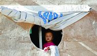 A displaced Iraqi child at Hasan Sham refugee camp some 30km east of Mosul.