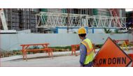 In this file photo, a worker stands outside the construction site of a new casino at Saipan, a U.S. South Pacific island, November 21, 2016. REUTERS/Natalie Thomas