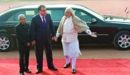 President of the Republic of Tajikistan Emomali Rahmon (centre) with President Pranab Mukherjee (left) and Prime Minister Narendra Modi during a ceremonial reception at The President's House in New Delhi yesterday.