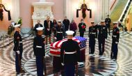 United States Marines stand guard as they surround the casket of former Astronaut and US Senator John Glenn, as he lays in state at the Ohio Statehouse, yesterday.