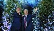 US President-elect Donald Trump and Vice President-elect Mike Pence appear together during a stop on his “USA Thank You Tour 2016” at the Orlando Amphitheater at the Central Florida Fairgrounds in Orlando, yesterday.