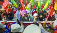  Indian police block farmers as they march towards the residence of Cabinet Minister Bikram Singh Majithia during a protest in Amritsar on December 19, 2016. Farmers protested against alleged anti-farmer policies imposed by the central and state governmen