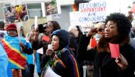 Demonstrators chant slogans against plans of Democratic Republic of Congo's President Joseph Kabila to stay in office past the end of his term, during a protest in central Brussels, Belgium, December 19, 2016. REUTERS/Francois Lenoir