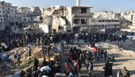 Civilians from East Aleppo, which was under siege by Assad regime forces and its supporter foreign terrorist groups, wait for their evacuation at Amerriye region of Aleppo, Syria on December 20, 2016. ( Mustafa Sultan - Anadolu Agency )