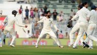 India's Ravindra Jadeja (C) celebrates with teammates after winning the fifth and final Test cricket match between India and England at the M.A. Chidambaram Stadium in Chennai on December 20, 2016. (AFP / ARUN SANKAR)