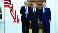 US President-elect Donald Trump (left) and Vice President-elet Mike Pence (right) greets retired Marine Gen. James Mattis at the main clubhouse at Trump National Golf Club in Bedminster, New Jersey.