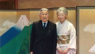 This handout photo taken on December 5, 2016 and provided by the Imperial Household Agency of Japan shows Japan's Emperor Akihito posing for a photo with Empress Michiko at the Imperial Palace in Tokyo. AFP PHOTO / Imperial Household Agency 