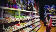 A woman looks at Christmas ornaments at a shop in Tlapujahua, Michoacan State, Mexico