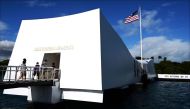 The USS Arizona Memorial, marking the resting place of the crewmen killed on December 7, 1941 when Japanese Naval Forces bombed Pearl Harbor, is pictured on December 24, 2016 in Pearl Harbor, Hawaii. AFP / Jerome CARTILLIER
