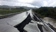 A damaged road is seen after a quake at Tarahuin, on Chiloe island, southern Chile, December 25, 2016. REUTERS/Alvaro Vidal 