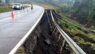 A damaged road is seen after a quake hit Chiloe island, southern Chile, December 25, 2016. REUTERS