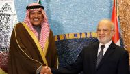 Iraqi Foreign Minister Ibrahim al-Jaafari (R) shakes hands with Kuwait's Foreign Minister Sabah Al-Khalid al-Sabah, during a news conference in Baghdad, December 28, 2016. REUTERS/Ahmed Saad