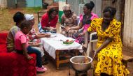 A woman cooks on an Envirofit stove in Kenya (Courtesy: Envirofit International) 