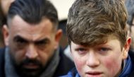 A boy cries at the funeral of Ayhan Arik, a victim of an attack by a gunman at Reina nightclub, in Istanbul, Turkey, January 1, 2017. REUTERS/Osman Orsal