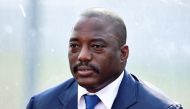 Under a landmark accord, the country's contested president, Joseph Kabila -- who under the constitution should have left office on December 20 -- will stay in power until elections are held at the 