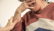 Maria, a former member of a Colombian paramilitary group cries during an interview with AFP on October 10, 2016. Colombian rebels may be preparing to lay down their guns, but the nation faces a deeper challenge to heal itself: treating mental illnesses fr