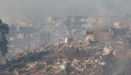 Destroyed houses are seen on a hill, where more than 100 homes were burned due to a forest fire but there have been no reports of death, local authorities said in Valparaiso, Chile January 2, 2017. REUTERS/Rodrigo Garrido