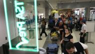 A US customs service IT glitch has left thousands of airline passengers waiting for clearance to enter the country. (AFP Photo/JOE RAEDLE)

