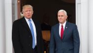 Donald Trump and Mike Pence arrive for a day of meetings at the clubhouse of Trump National Golf Club, November 20, 2016 in Bedminster, NJ (AFP / DON EMMERT) 