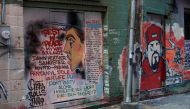 A mural in an alley in Vancouver's Downtown Eastside, on December 21, 2016, painted by a man mourning the fentanyl overdose death of his wife, with names of other victims of the crisis that killed 128 people in British Columbia in November. AFP / Deborah 