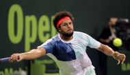 Jo-Wilfried Tsonga in action. REUTERS/Naseem Zeitoon
