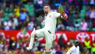 Australia's David Warner celebrates after reaching his century during the first session of the third Test against Pakistan at the Sydney Cricket Ground in Sydney, Australia yesterday.