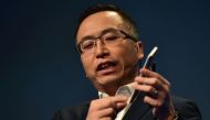 George Zhao, president of Honor, a division of Huawei, speaks while holding the newly introduced Honor 6X phone during the company's press conference at the 2017 Consumer Electronics Show (CES2017) in Las Vegas, Nevada, on January 3, 2017. AFP / Frederic 