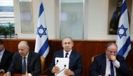 Israeli Prime Minister Benjamin Netanyahu attends the weekly cabinet meeting at his office in Jerusalem on November 13, 2016 (AFP / RONEN ZVULUN) 