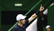 Britain's Andy Murray reacts as he plays against Austria's Gerald Melzer during the second round of the ATP Qatar Open tennis competition in Doha on Wednesday. The world number one star Murray claimed his 26th consecutive victory on Wednesday night with a