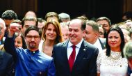 Opposition's parliamentary leader Julio Borges (centre) and First Vice-President of the assembly Freddy Guevara (left) are seen along with supporters during the swearing-in ceremony in Caracas, yesterday.