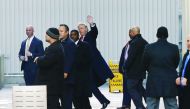 US President-elect Donald Trump (centre) exits One World Trade Center following a meeting in Manhattan, New York City, US.