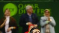 Novak Djokovic of Serbia celebrates after winning the Qatar ExxonMobil Open 2017.
