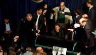 People are seen around the coffin of Former Iranian President Akbar Hashemi Rafsanjani at the imam khomeini Hoseyniyeh in Tehran, Iran on January 8, 2017. Former Iranian President Akbar Hashemi Rafsanjani passed away at the age of 82 at a hospital in Tehr