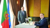 Portuguese Ambassador, Antonio Tanger (left), looks on as Ambassador of Uruguay, Dr Jorge Antonio Sere Sturzenegger, signs a book of condolence at The Pearl-Qatar yesterday for former President Portuguese Mario Soares, who died on January 7.  Pic: Kammutt